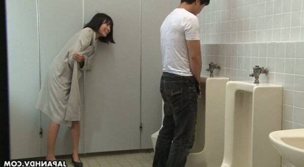 Crazy Asian chick Uta Kohaku pisses on dick of one stranger dude in a public toilet on girlsasian.one