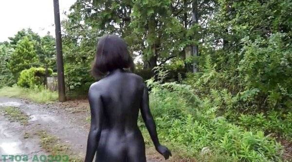 Asian girl likes to walk all painted in black outdoor - Japan on girlsasian.one