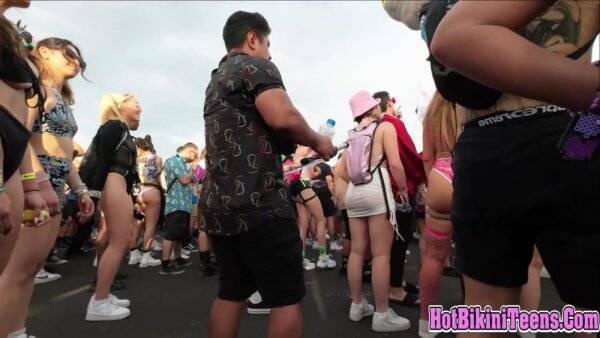 Hot big ass asian raver girl shaking her big ass cheeks at rave festival on girlsasian.one