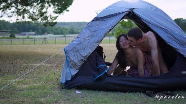 Asian chick is fucking with her boyfriend in a tent outdoors on girlsasian.one